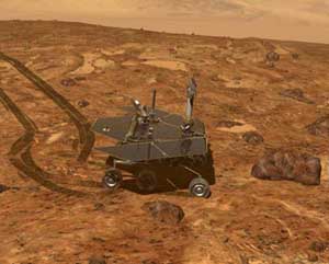 The Mars Exploration Rover drives over to study a particularly interesting rock. Image credit NASA/JPL.