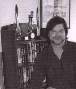 Allen Steele with his Hugos - Picture  Copyright © 2002 by Linda Steele.