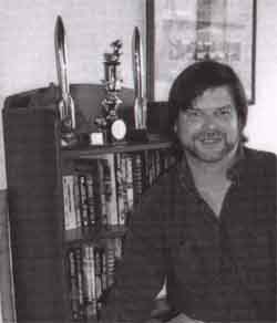 Allen Steele with his Hugos - Picture Copyright © 2002 by Linda Steele.
