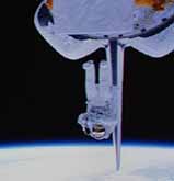Carl doing an untethered EVA. Click here for a NASA site with more pictures from this mission.