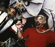 Carl pre-breathing before his STS-64 EVA. Note the checklist floating over his head. Click here for a NASA site with more pictures from this mission.