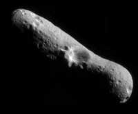 Asteroid Ida and it's satellite Dactyl {Dactyl is the small dot on the right side of the image.}