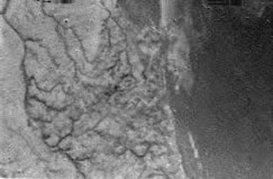 Huygens descent image, 16km altitude, 40m resolution. Image credit ESA/NASA/University of Arizona.