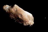 Asteroid Ida and it's satellite Dactyl {Dactyl is the small dot on the right side of the image.}