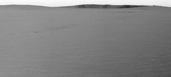 Endurance Crater on the horizon. Image credit NASA/JPL.