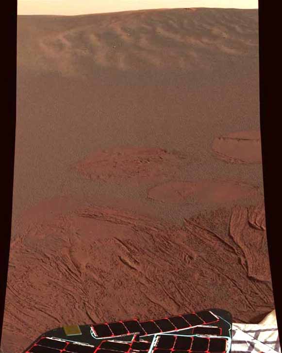 The first color image of the Martian surface sent back by the Mars Exploration Rover Opportunity. Image credit NASA/JPL.