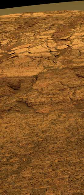 Layered rocks within Endurance crater with RAT holes.  Image credit NASA/JPL.